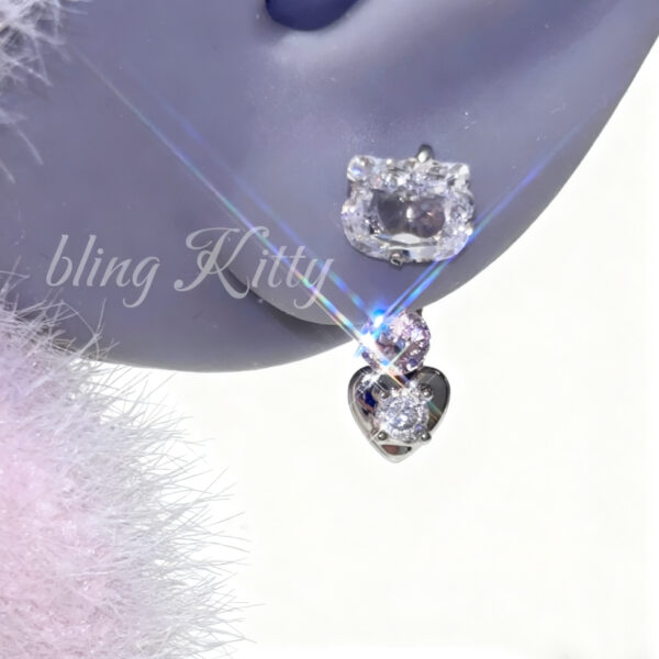 Kitty's horse hoof-shaped stud earrings